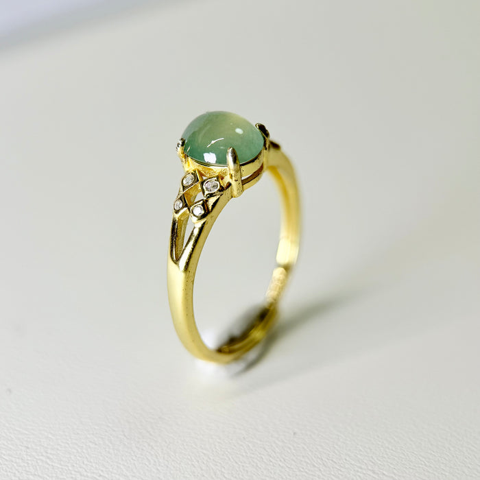 Celestial Glint – Icy Pastel Green Jadeite Cabochon Ring (S925 Silver, Gold Finish)