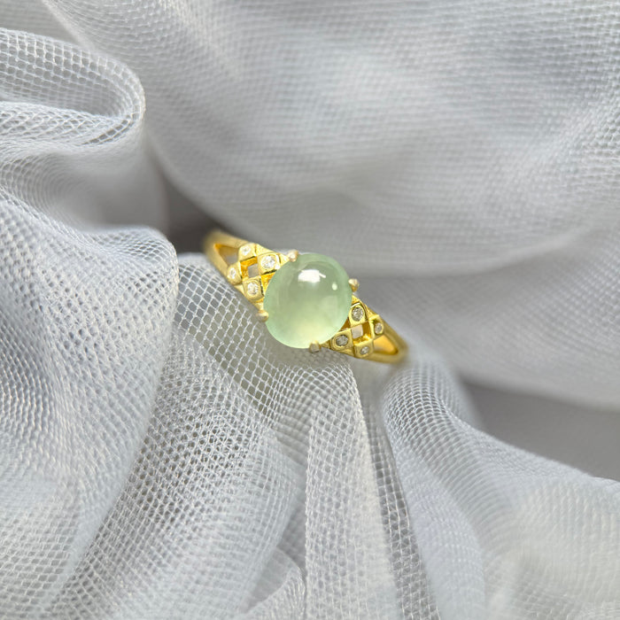 Celestial Glint – Icy Pastel Green Jadeite Cabochon Ring (S925 Silver, Gold Finish)