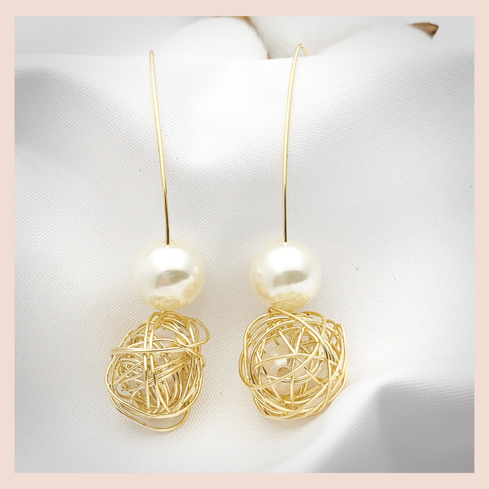 Simple wire coil & pearl earring